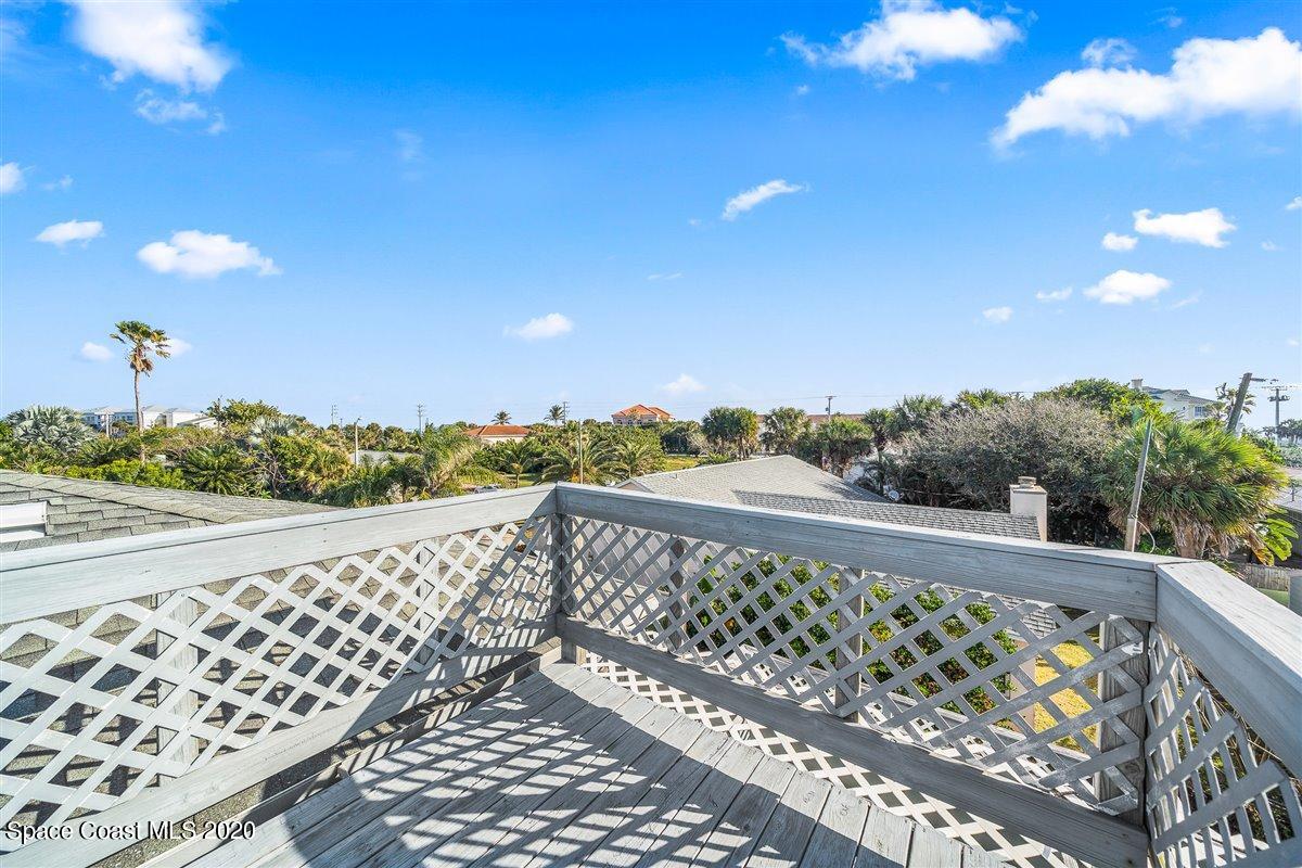 145 Richards Road Melbourne Beach, FL 32951 - Photo 38 of 53 a view of balcony with wooden floor and fence