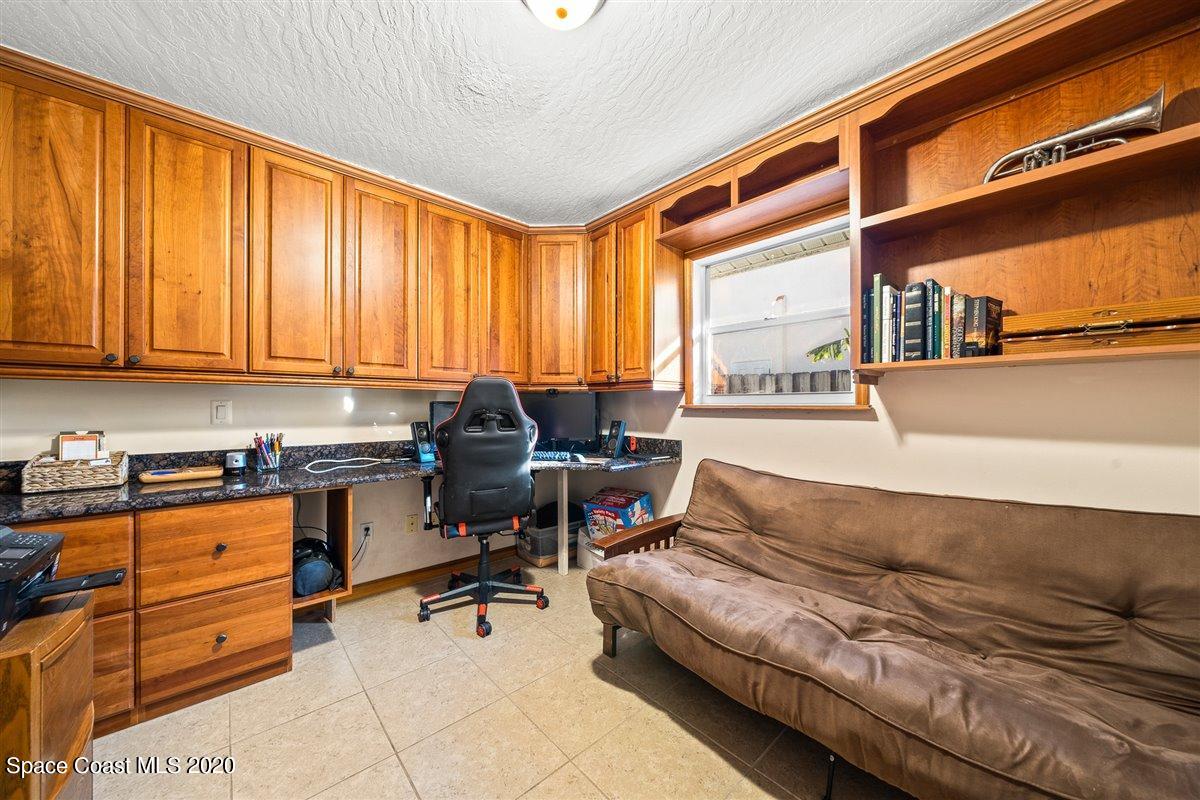 145 Richards Road Melbourne Beach, FL 32951 - Photo 45 of 53 a reading room with furniture and a window