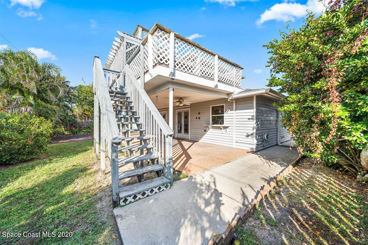 145 Richards Road Melbourne Beach, FL 32951 - Photo 48 of 53 a view of a house with a yard