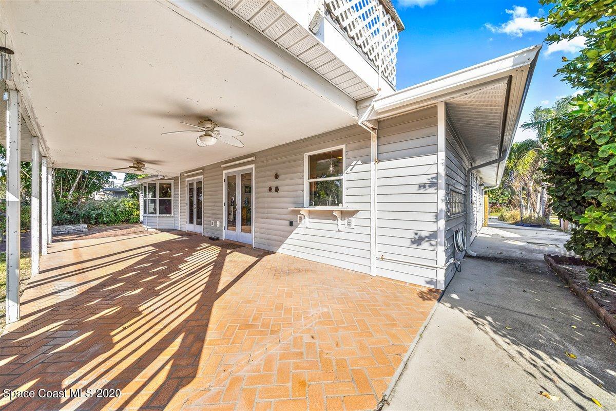 145 Richards Road Melbourne Beach, FL 32951 - Photo 49 of 53 a view of a house with a patio