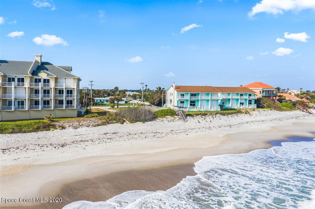 145 Richards Road Melbourne Beach, FL 32951 - Photo 52 of 53 a view of multiple houses with a road