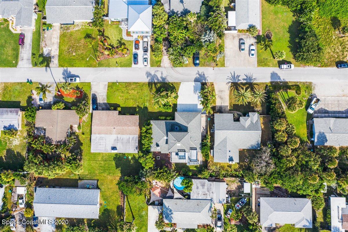 145 Richards Road Melbourne Beach, FL 32951 - Photo 7 of 53 an aerial view of multiple houses with yard