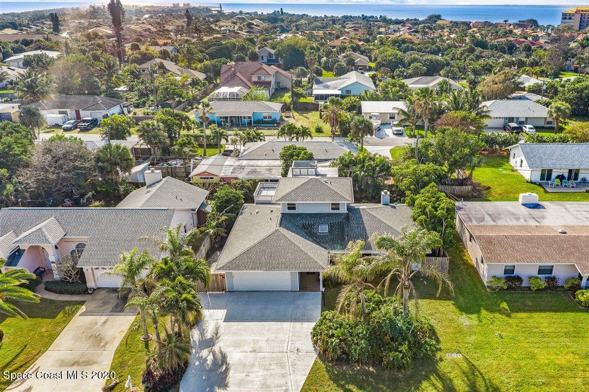 145 Richards Road Melbourne Beach, FL 32951 - Photo 8 of 53 an aerial view of residential houses with outdoor space