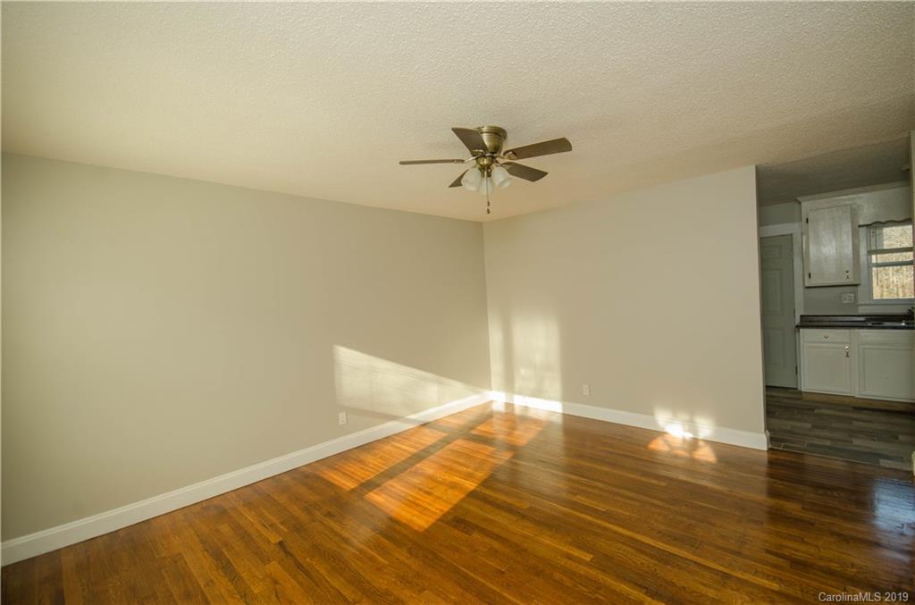 356 Old Pinckney Road York, SC 29745 - Photo 4 of 10 a view of empty room with wooden floor