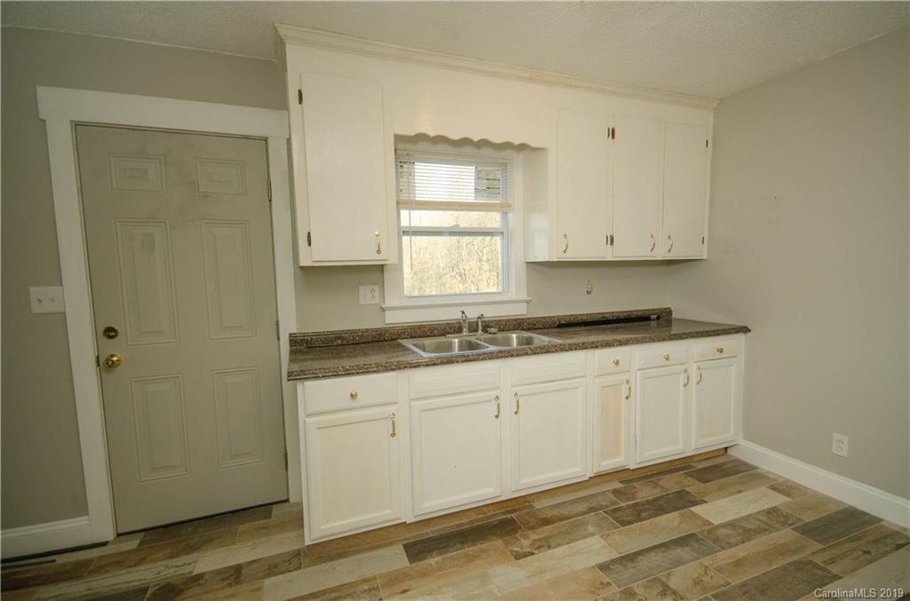 356 Old Pinckney Road York, SC 29745 - Photo 5 of 10 a view of a kitchen with granite countertop cabinets