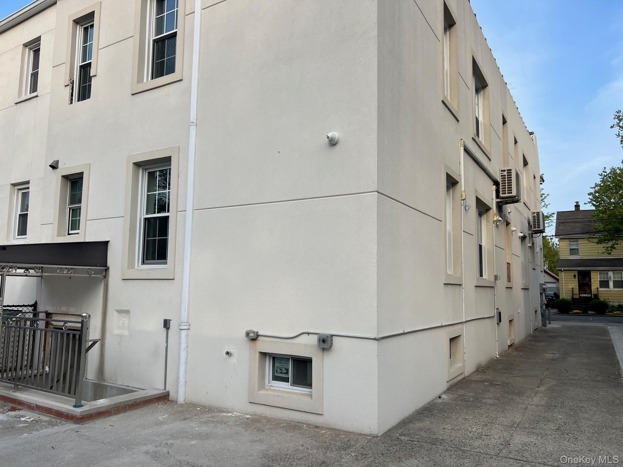 89-21 69th Road, Unit 2R Queens, NY 11375 - Photo 15 of 16 a view of a house with a street