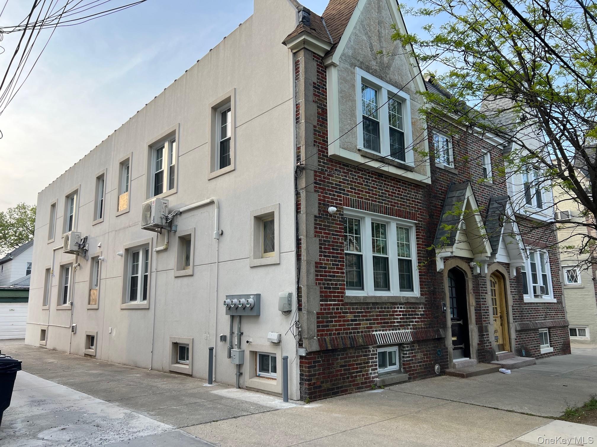 89-21 69th Road, Unit 2R Queens, NY 11375 - Photo 6 of 16 a front view of a building with a street