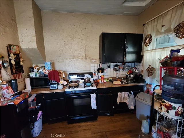 a room with furniture and flat screen tv