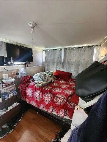 a room with furniture and a flat screen tv
