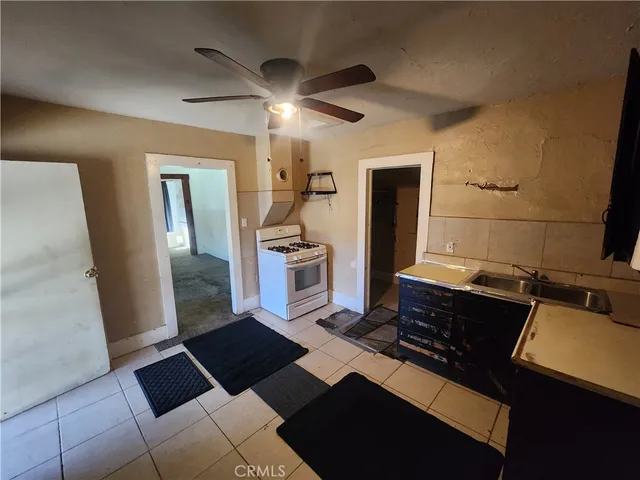 a black and white checkered floor with a rug