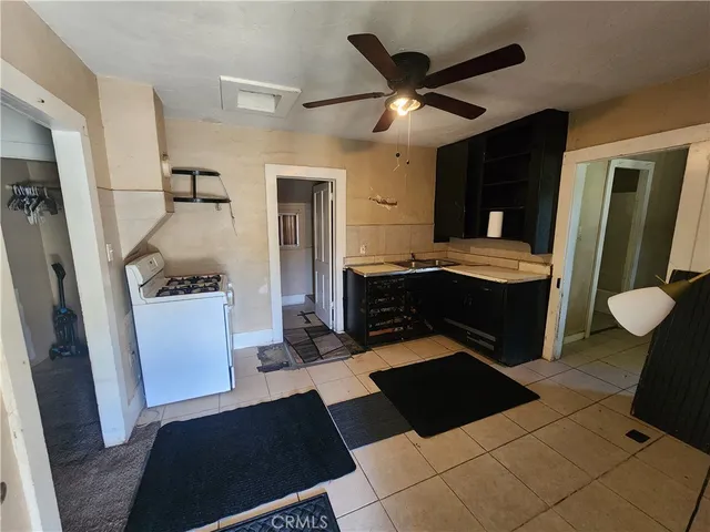 a living room with a couch and a large window
