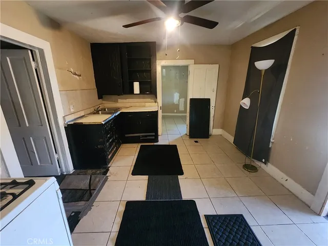 a close view of a bathroom with sink and mirror
