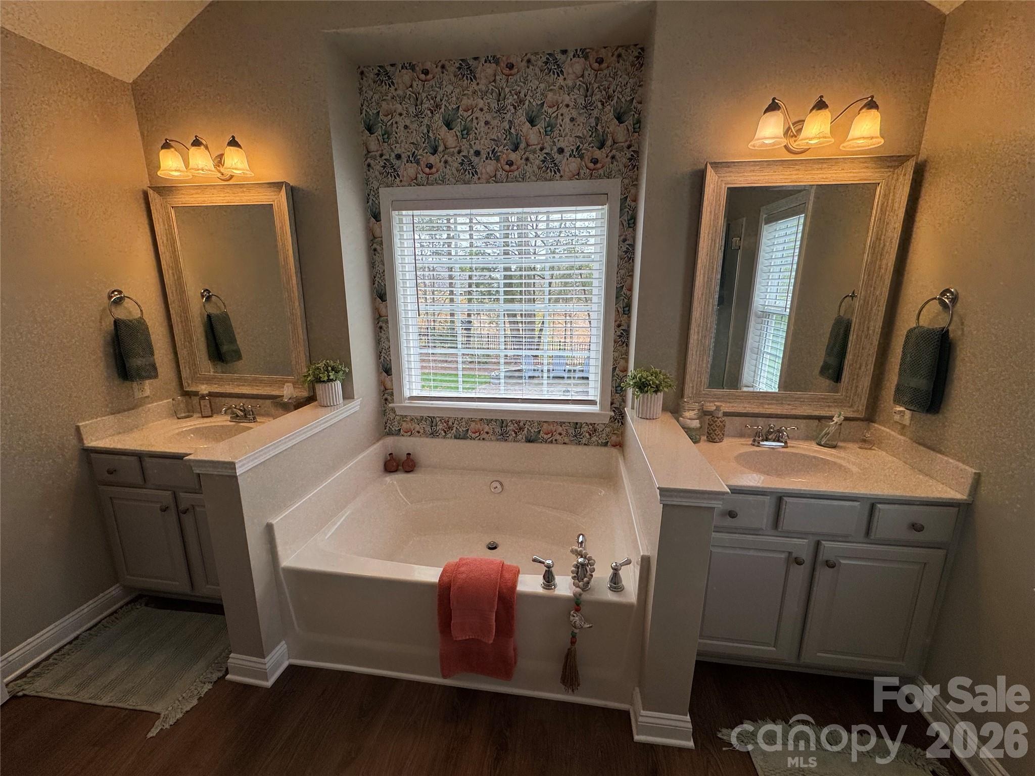 110 Burtons Barn Road Mooresville, NC 28115 - Photo 13 of 37 a bathroom with a tub sink and mirror