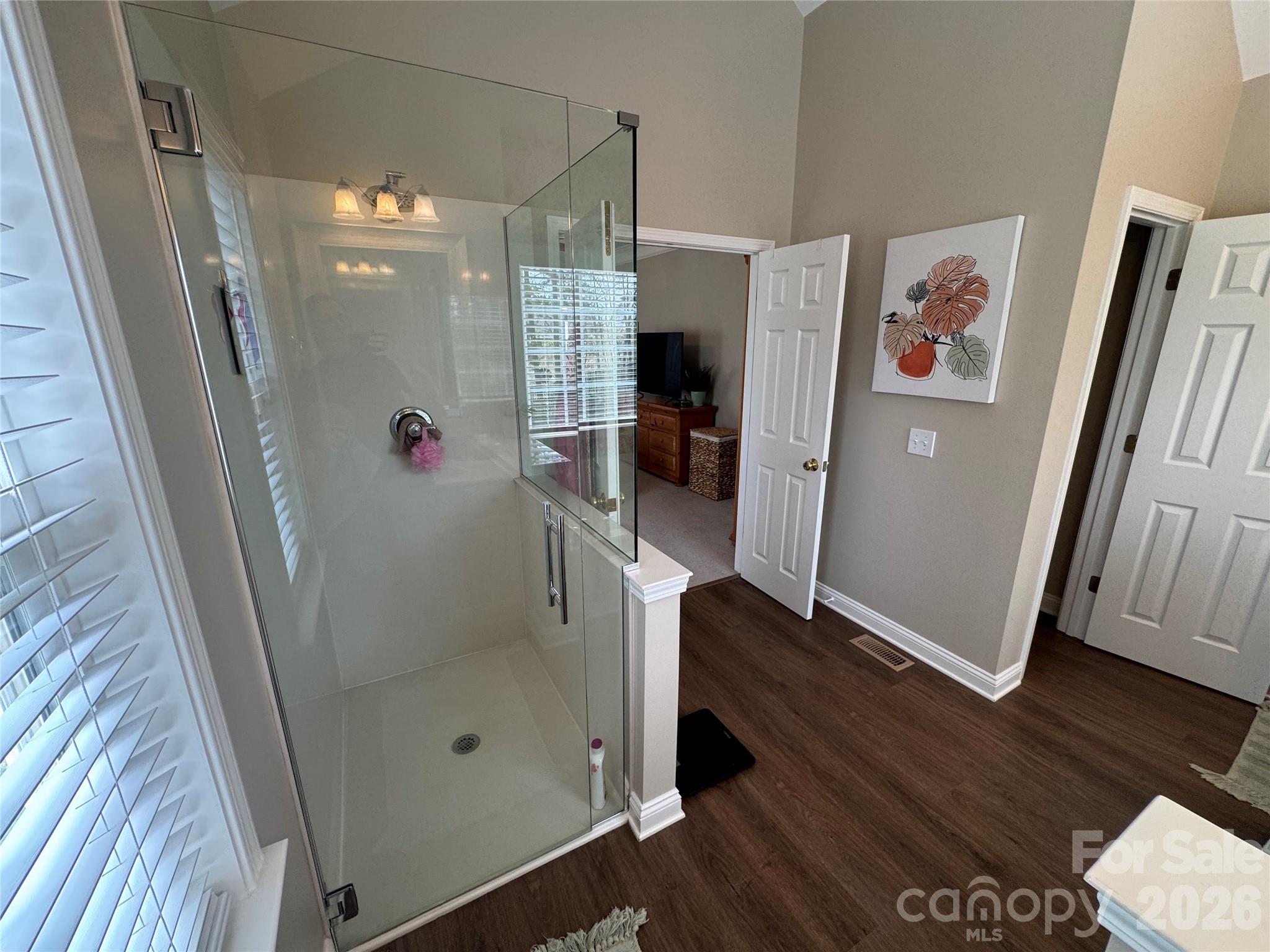 110 Burtons Barn Road Mooresville, NC 28115 - Photo 15 of 37 a bathroom with a glass door shower and a sink