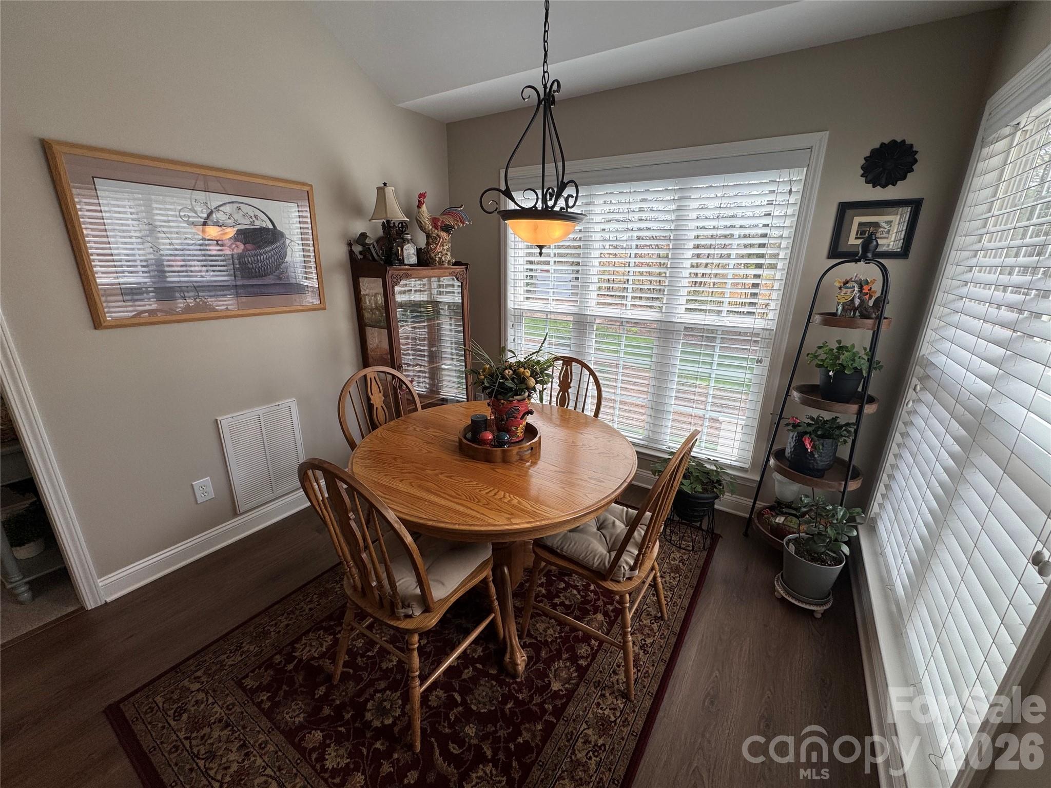 110 Burtons Barn Road Mooresville, NC 28115 - Photo 19 of 37 a view of a dining room with furniture window and outside view