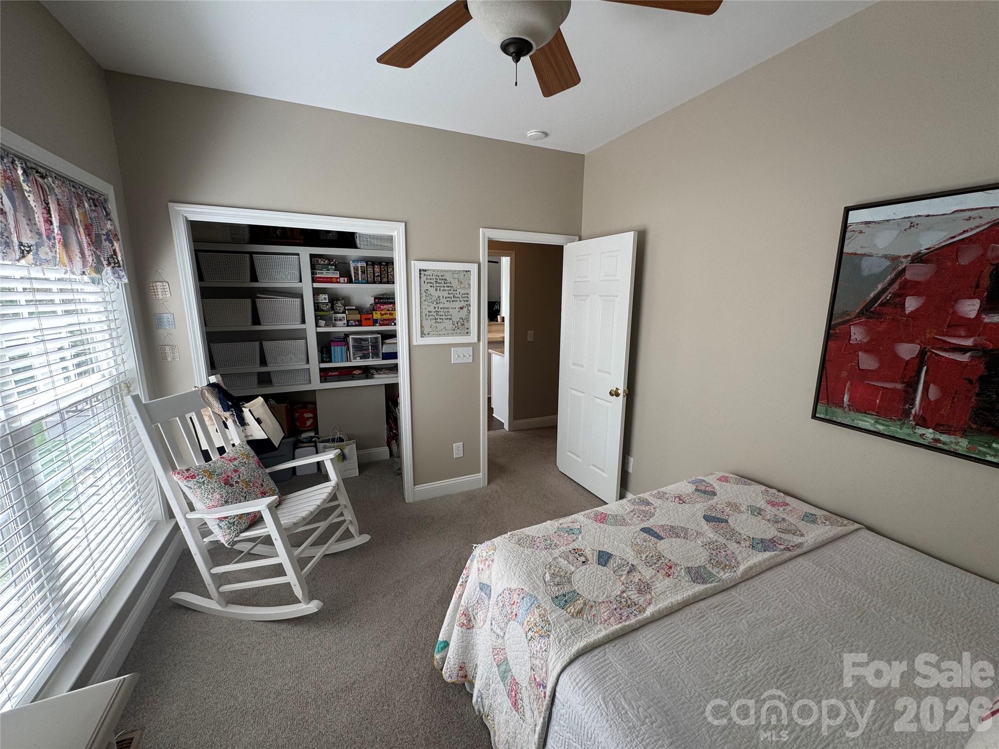 110 Burtons Barn Road Mooresville, NC 28115 - Photo 22 of 37 a bedroom with a bed and furniture