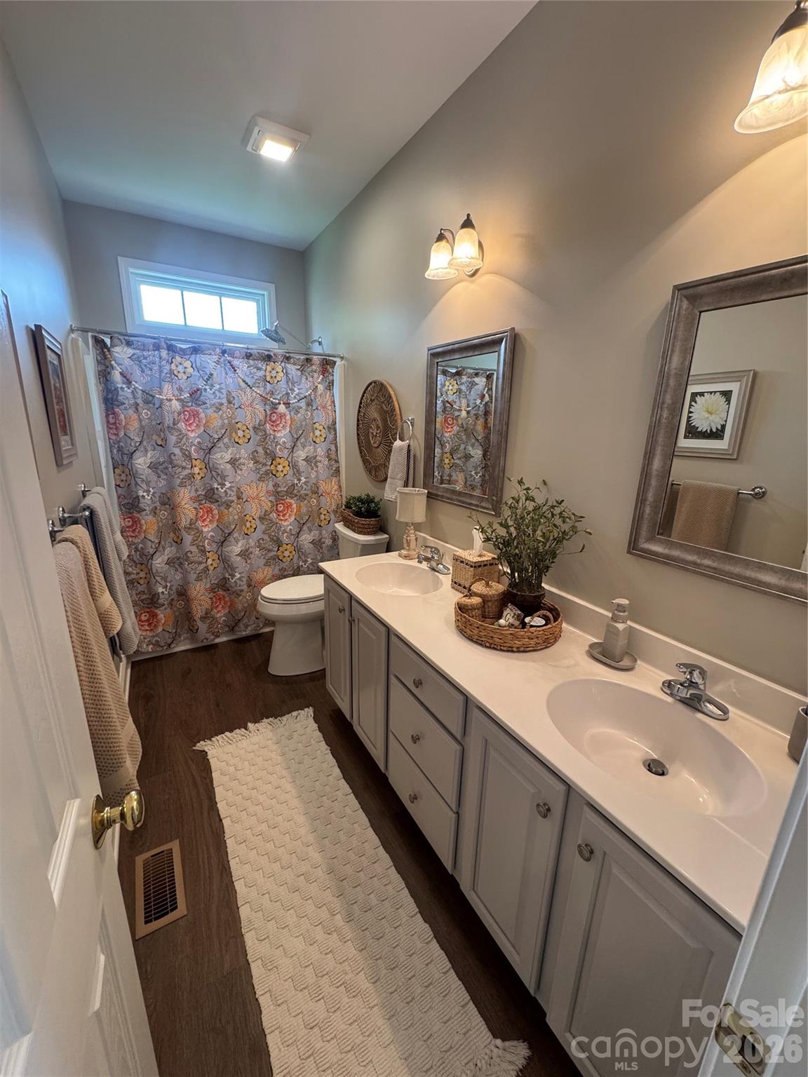 110 Burtons Barn Road Mooresville, NC 28115 - Photo 25 of 37 a bathroom with a double vanity sink mirror and shower