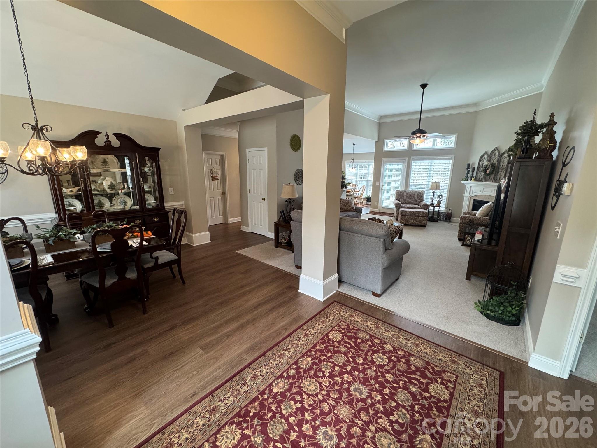 110 Burtons Barn Road Mooresville, NC 28115 - Photo 3 of 37 a living room with furniture rug and wooden floor