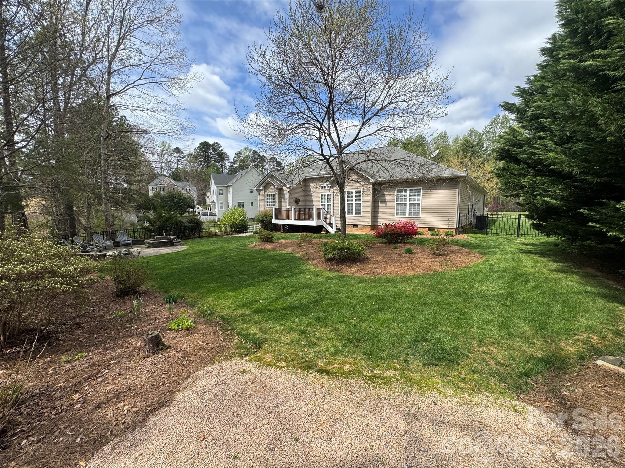 110 Burtons Barn Road Mooresville, NC 28115 - Photo 35 of 37 a front view of a house with a garden and trees