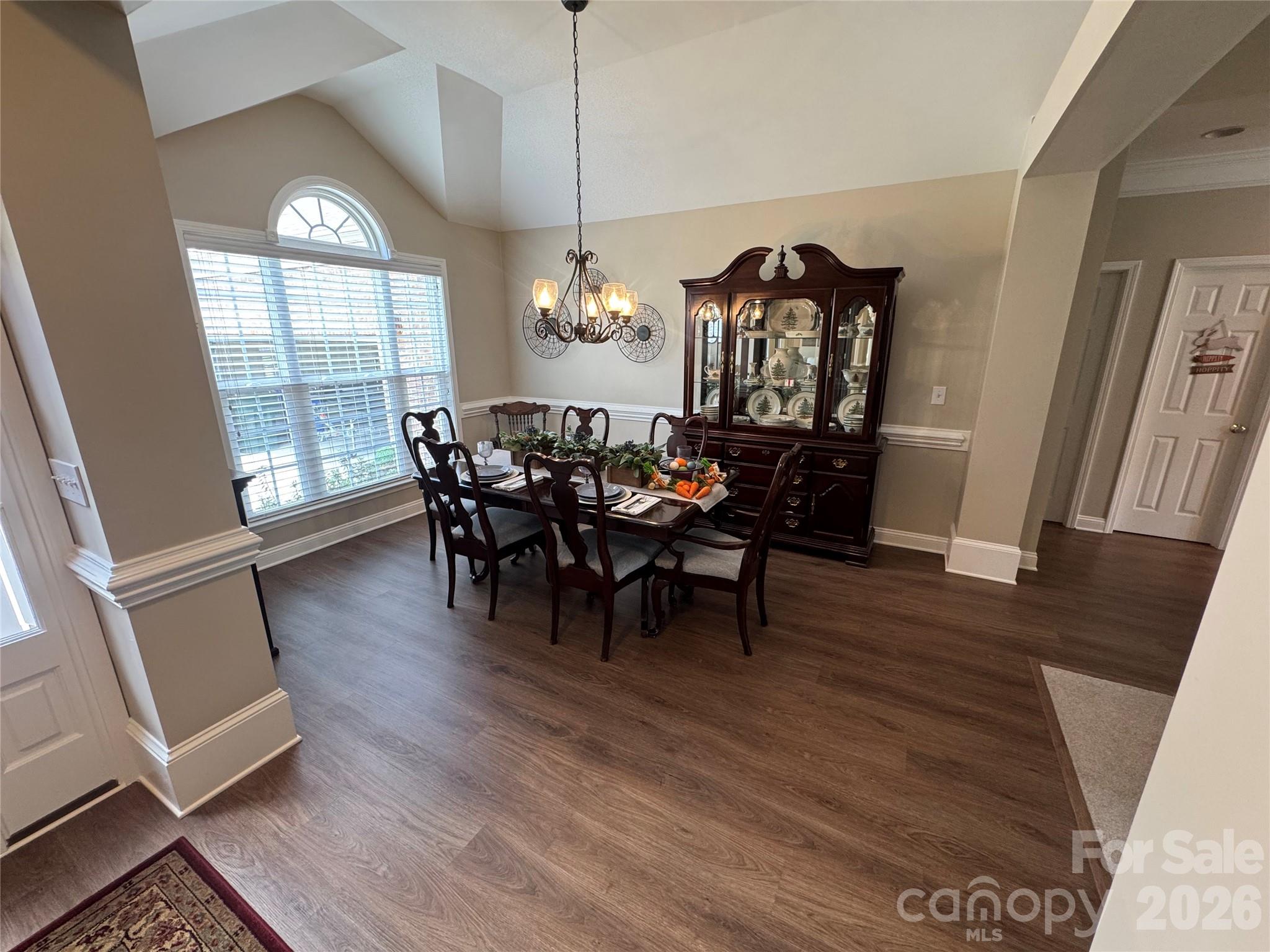 110 Burtons Barn Road Mooresville, NC 28115 - Photo 4 of 37 a view of a dining room with furniture window and wooden floor