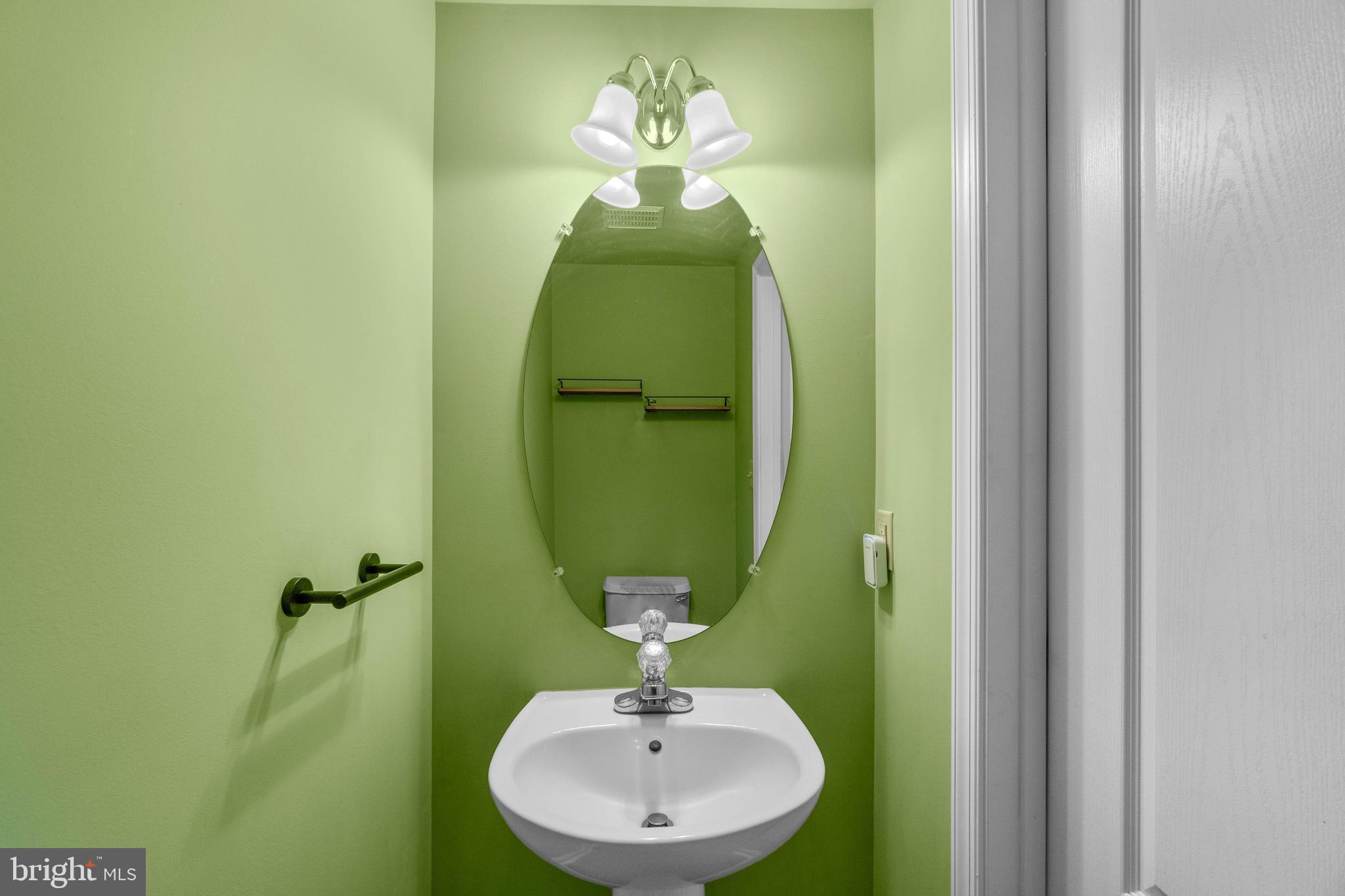 209 Pidco Road Reisterstown, MD 21136 - Photo 8 of 27 Main level half bathroom