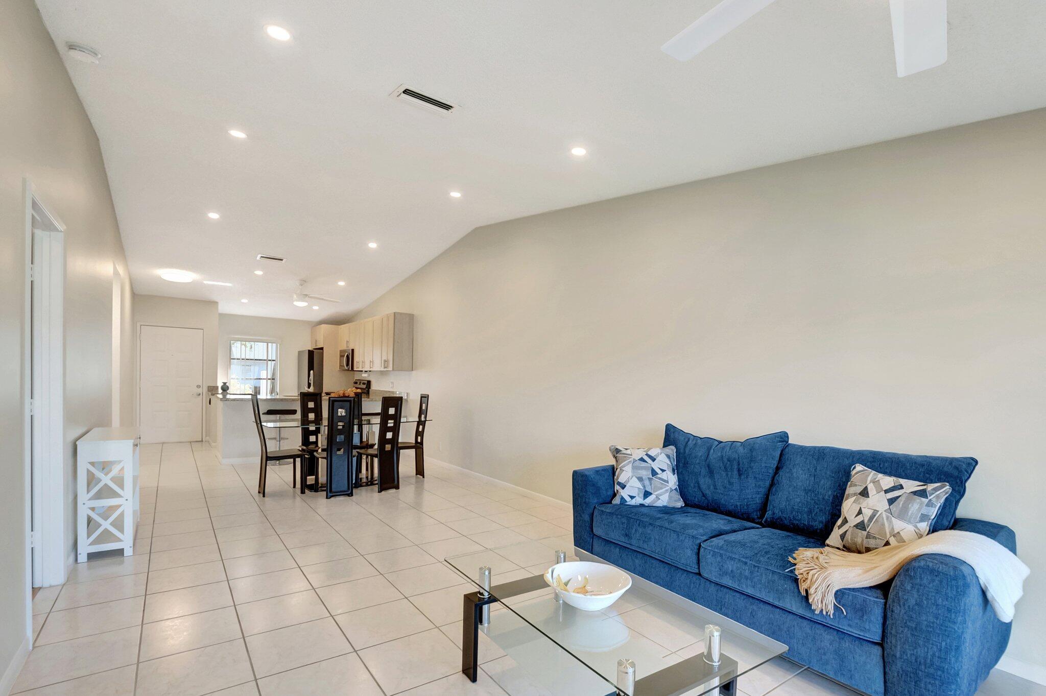 8889 Windtree Street Boca Raton, FL 33496 - Photo 14 of 47 Looking back towards kitchen