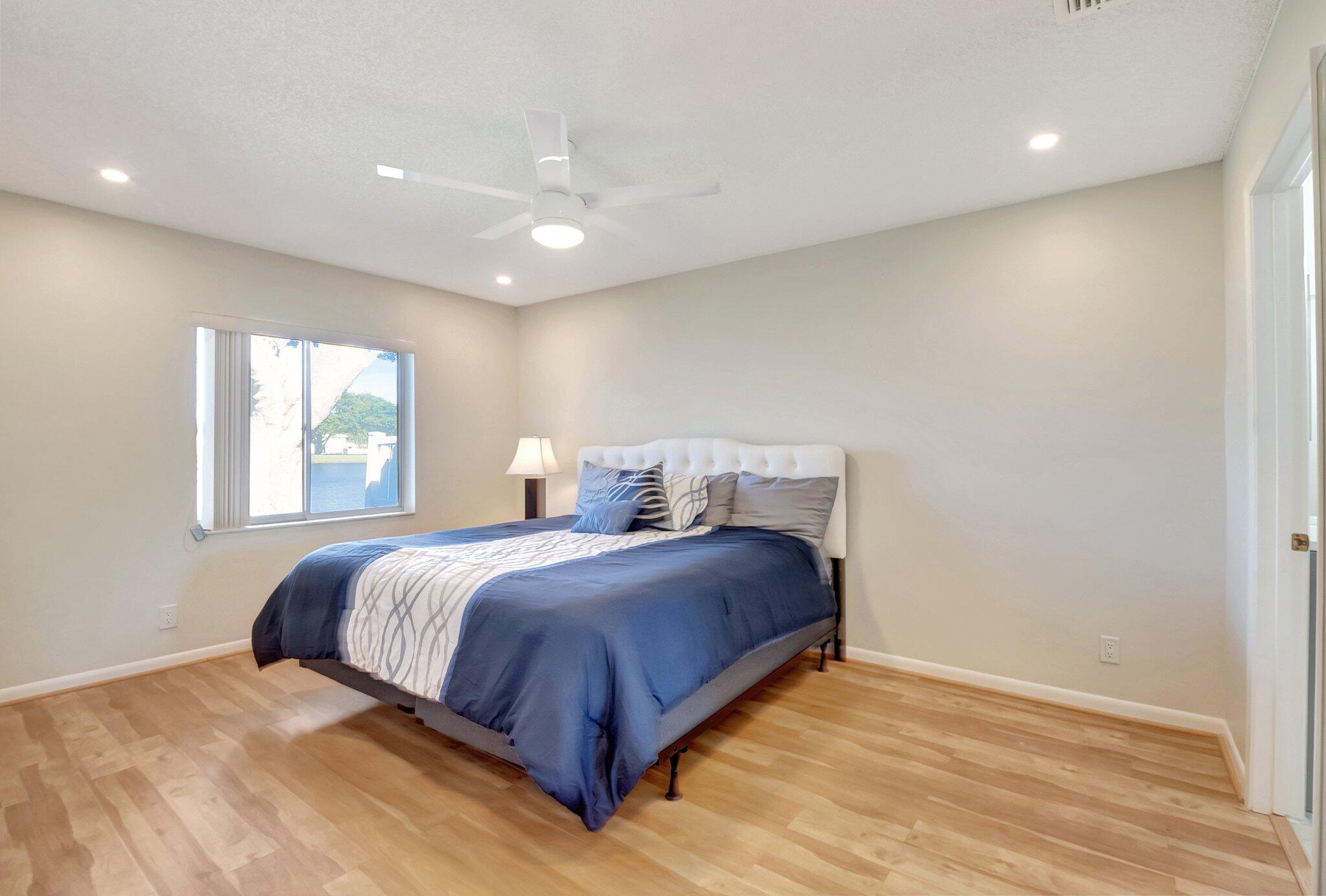 8889 Windtree Street Boca Raton, FL 33496 - Photo 16 of 47 Primary Bedroom