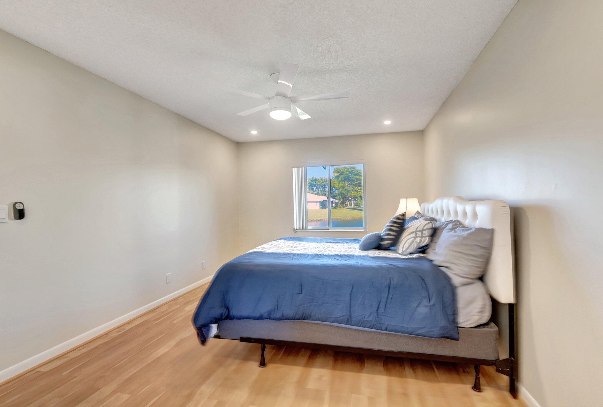 8889 Windtree Street Boca Raton, FL 33496 - Photo 17 of 47 Primary Bedroom