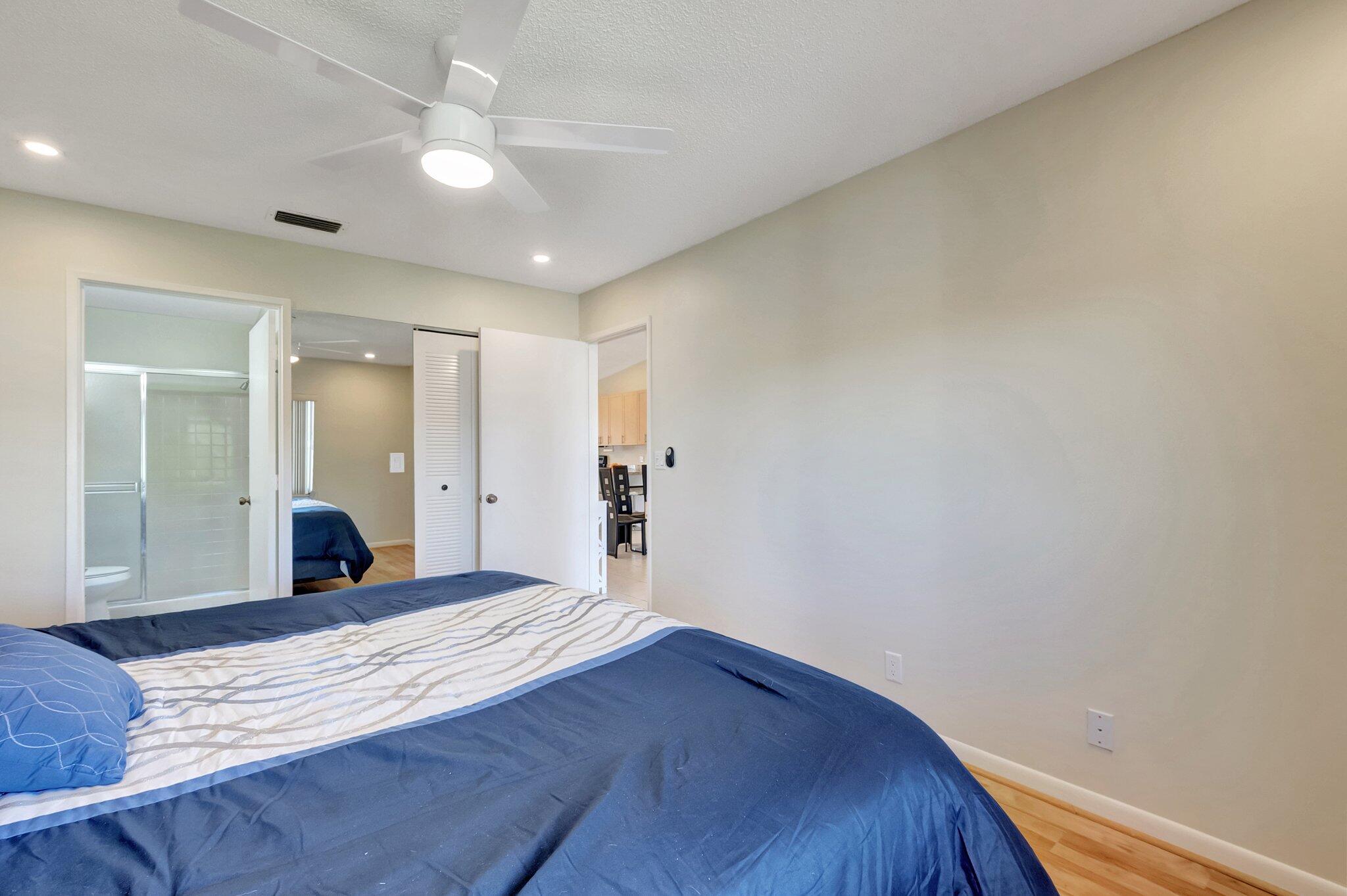 8889 Windtree Street Boca Raton, FL 33496 - Photo 18 of 47 Primary Bedroom