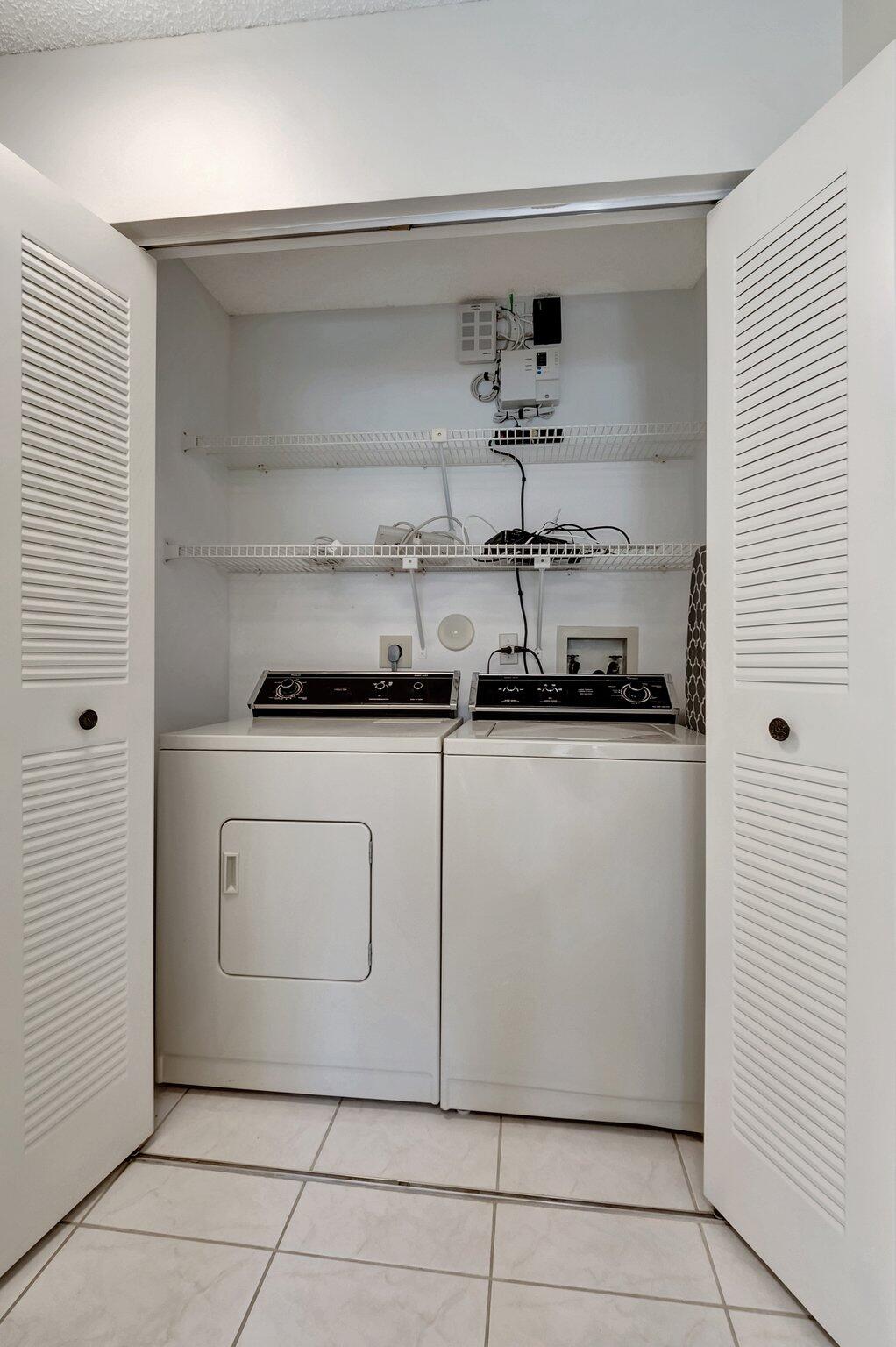 8889 Windtree Street Boca Raton, FL 33496 - Photo 24 of 47 Washer and dryer