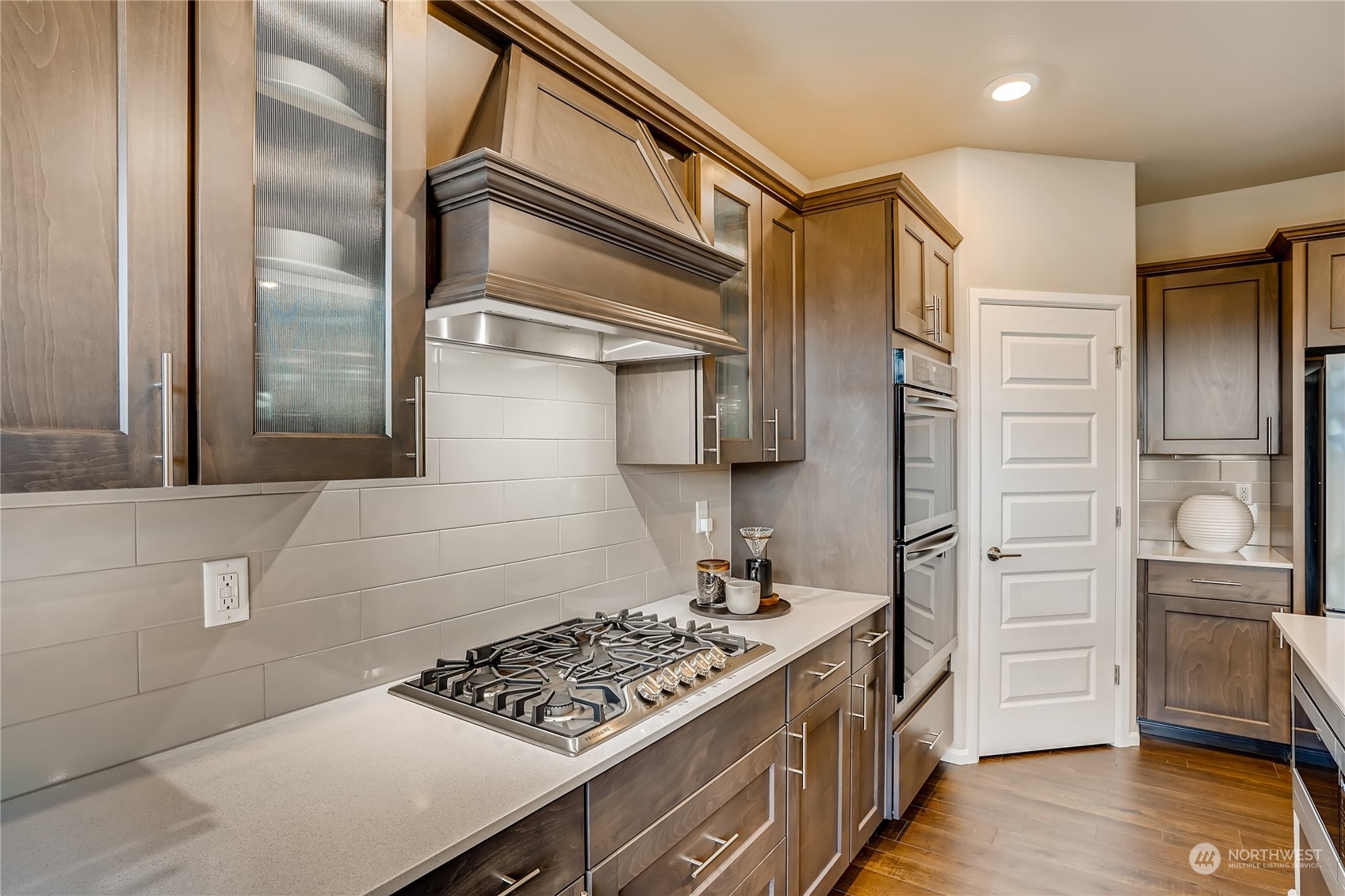 4131 235th Place Southeast, Unit 40 Bothell, WA 98021 - Photo 13 of 24 a kitchen with stainless steel appliances granite countertop a sink stove and refrigerator
