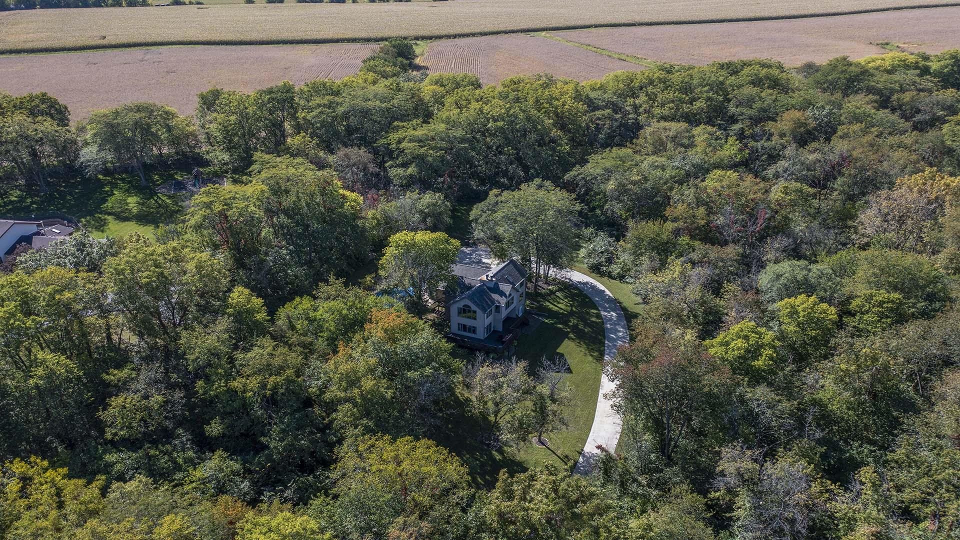 4432 Highway 2 Oregon, IL 61061 - Photo 11 of 49 an aerial view of a house with a yard and outdoor seating