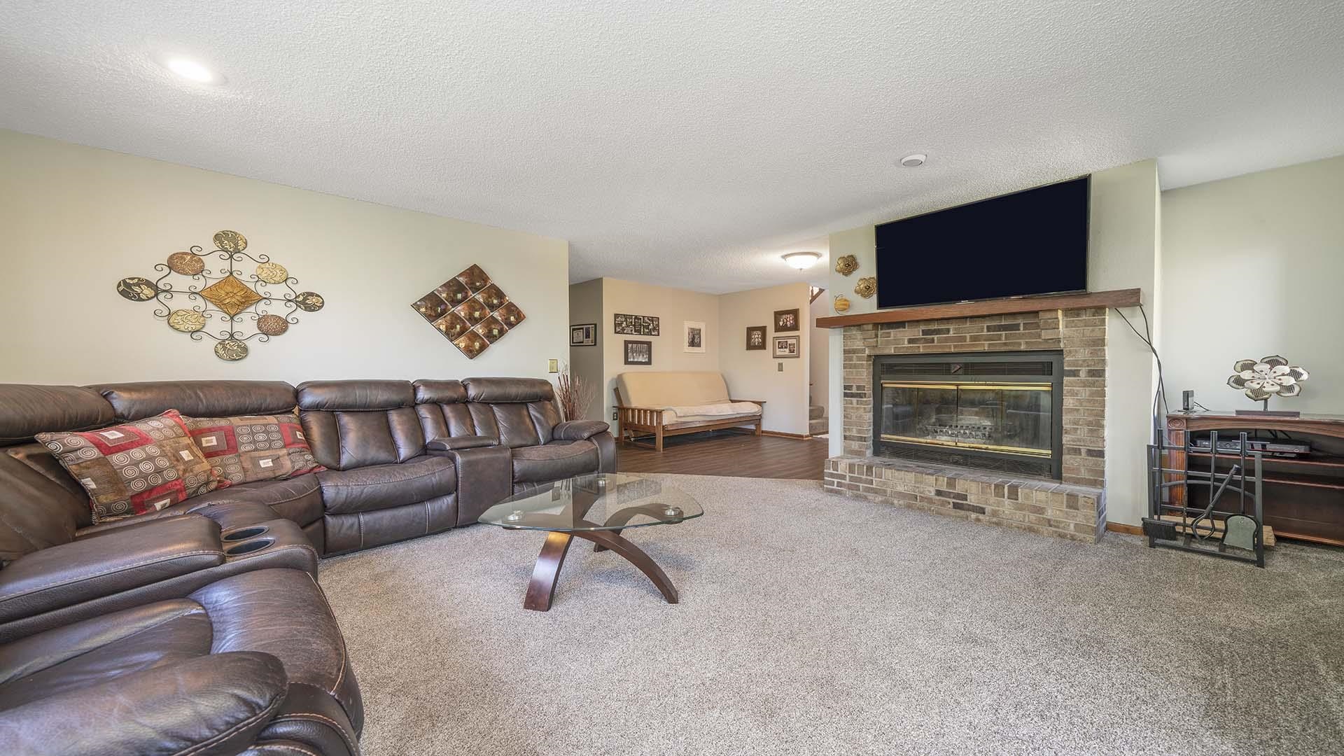 4432 Highway 2 Oregon, IL 61061 - Photo 13 of 49 a living room with furniture and a flat screen tv