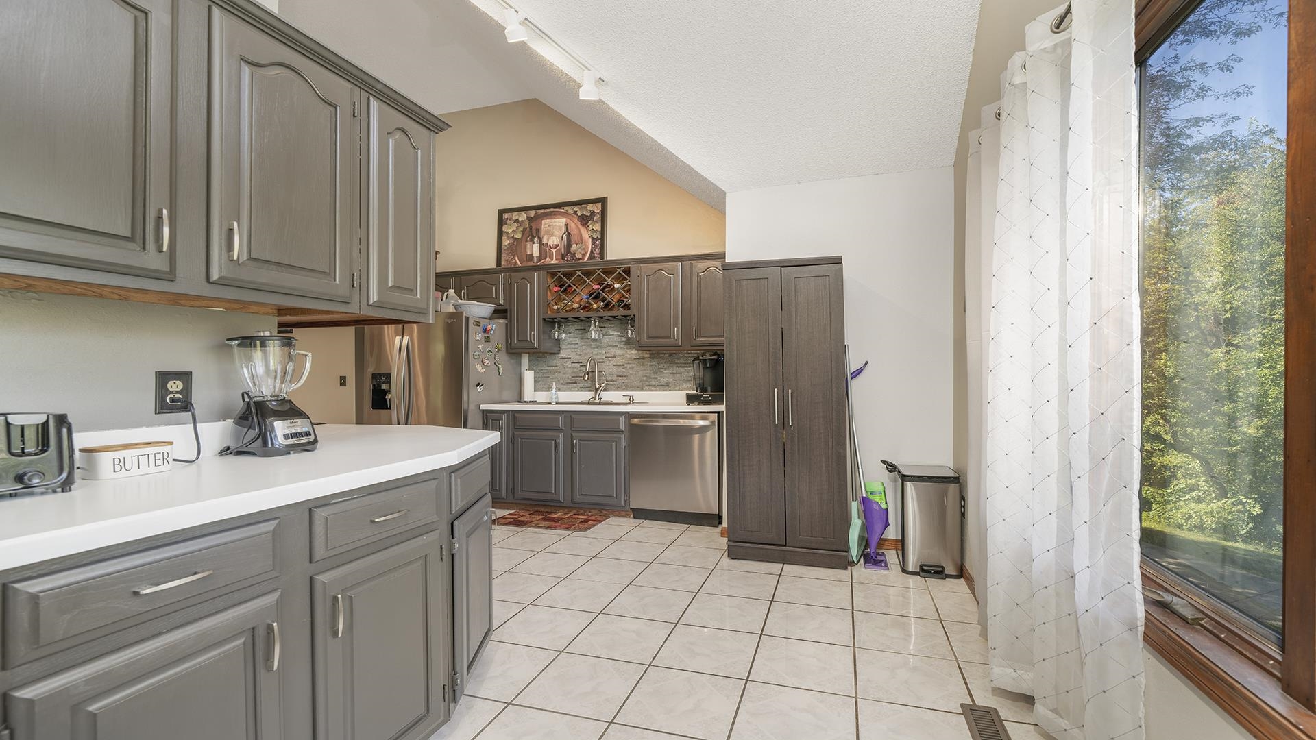 4432 Highway 2 Oregon, IL 61061 - Photo 16 of 49 a kitchen with a sink cabinets and appliances