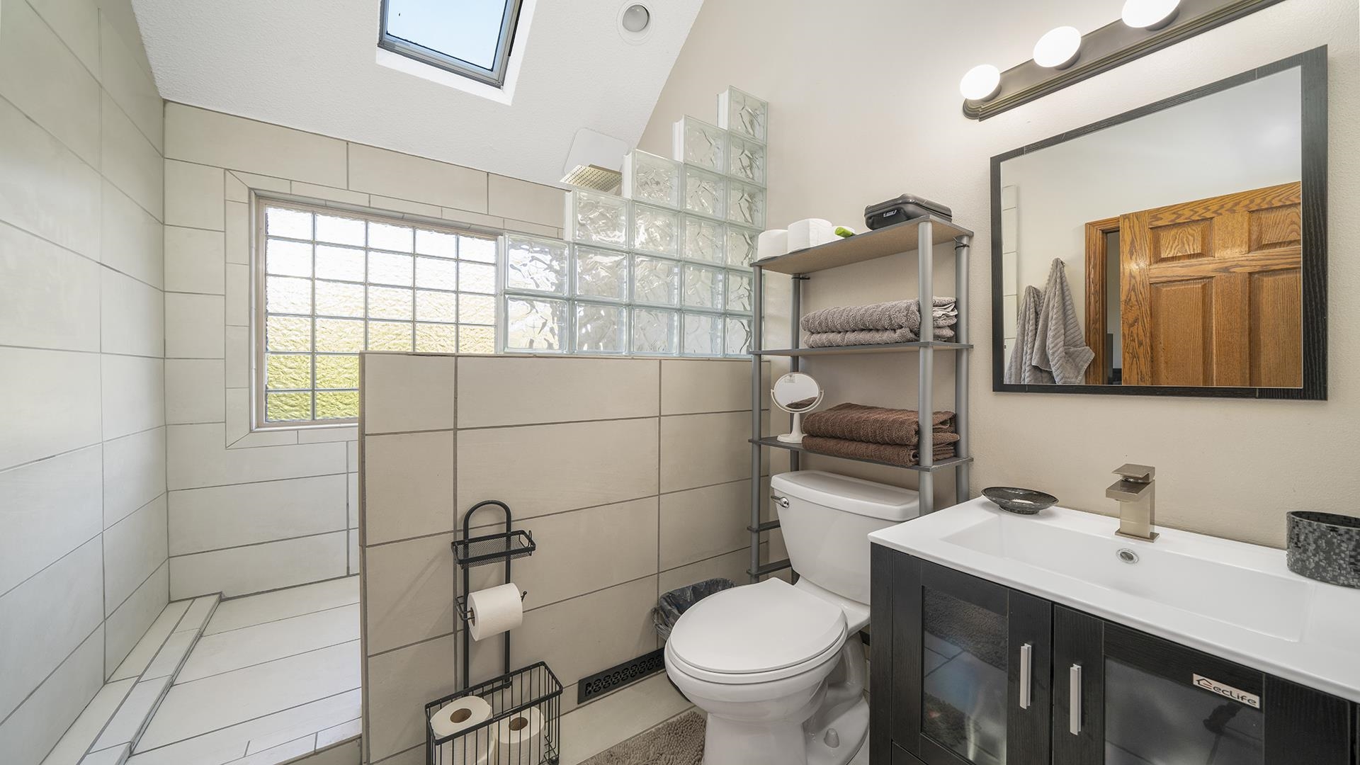4432 Highway 2 Oregon, IL 61061 - Photo 22 of 49 a bathroom with a sink toilet and shower