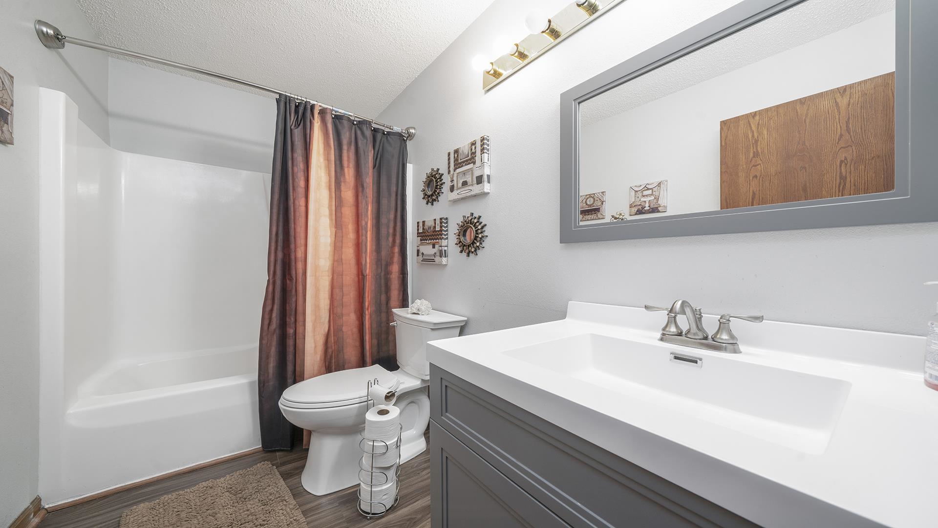 4432 Highway 2 Oregon, IL 61061 - Photo 31 of 49 a bathroom with a sink toilet and shower