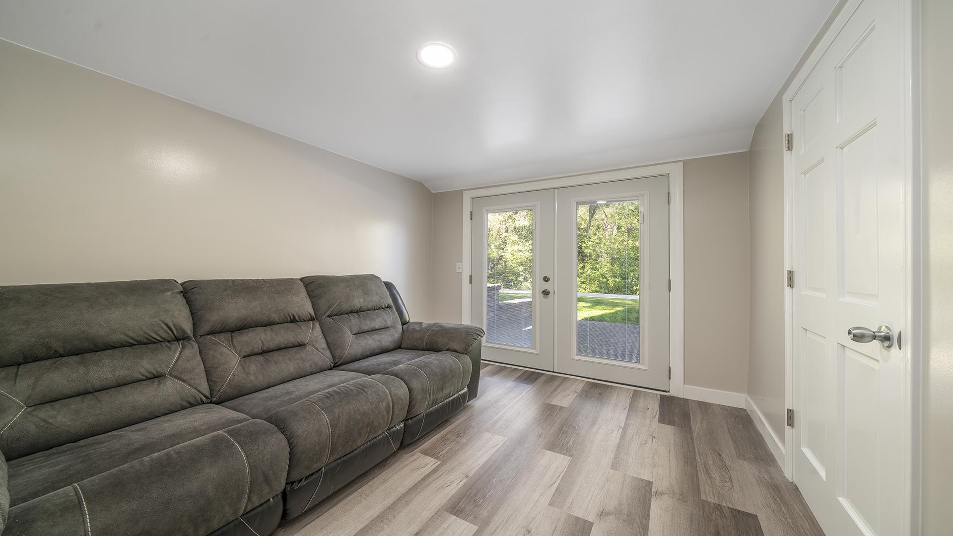 4432 Highway 2 Oregon, IL 61061 - Photo 36 of 49 a living room with furniture and a large window