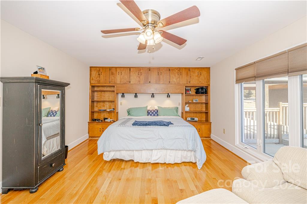 5100 Rounding Run Road Charlotte, NC 28277 - Photo 17 of 46 a bed sitting in a bedroom next to a window