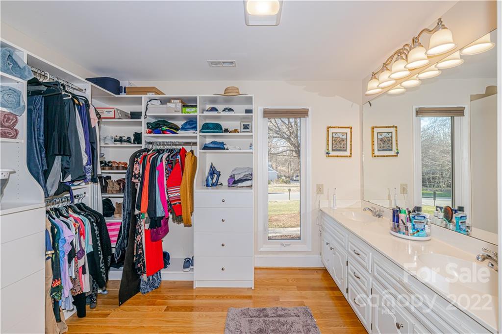 5100 Rounding Run Road Charlotte, NC 28277 - Photo 22 of 46 a view of walk in closet with clothes and shoes