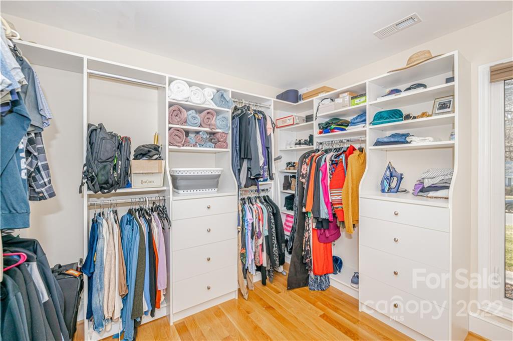 5100 Rounding Run Road Charlotte, NC 28277 - Photo 23 of 46 a view of walk in closet with clothes and shoes