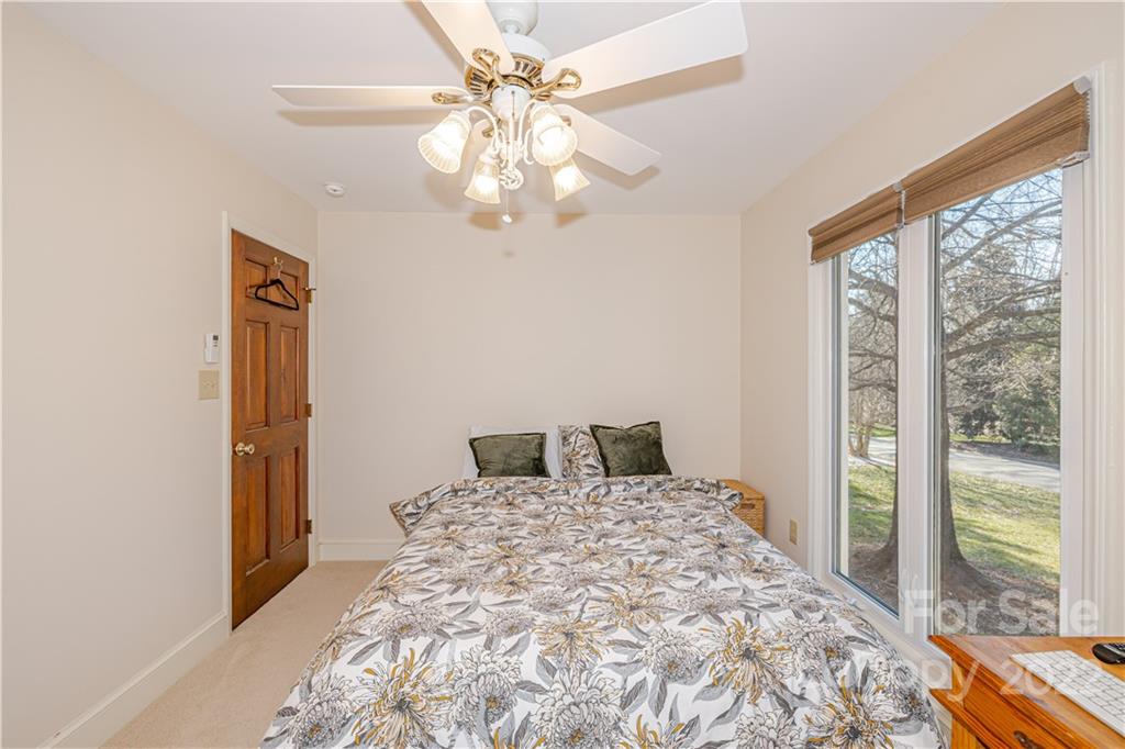5100 Rounding Run Road Charlotte, NC 28277 - Photo 28 of 46 a bedroom with a large bed and a window
