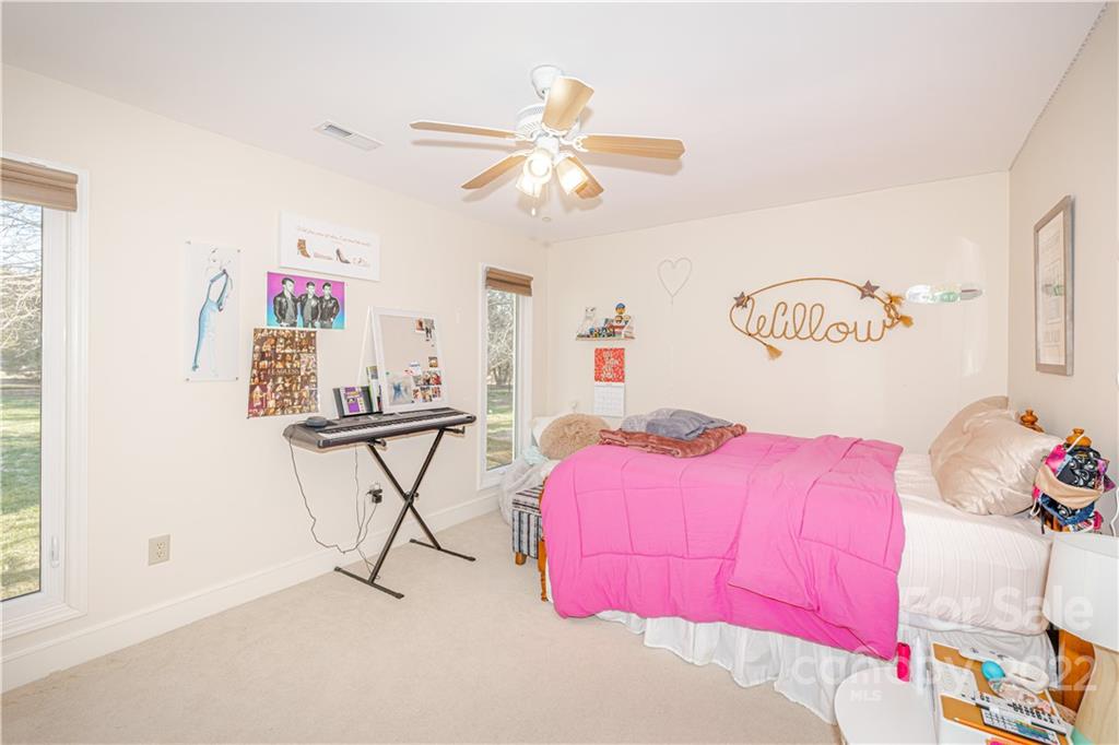 5100 Rounding Run Road Charlotte, NC 28277 - Photo 30 of 46 a bedroom with a bed and window