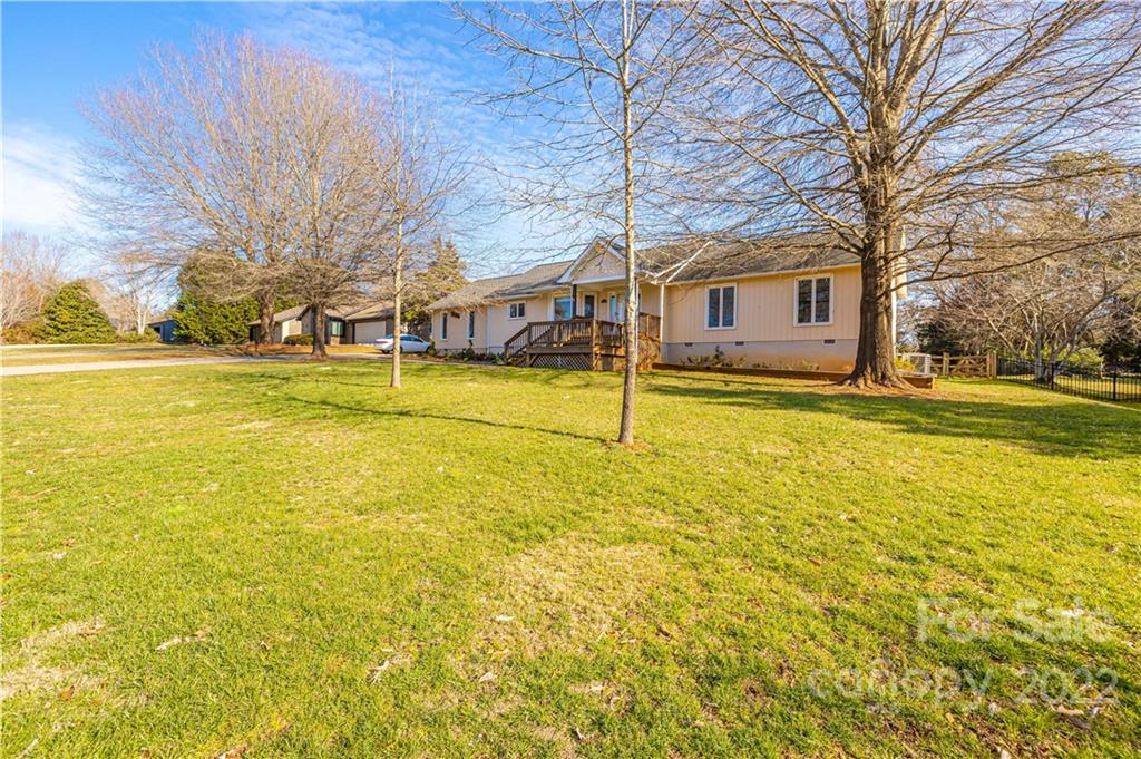 5100 Rounding Run Road Charlotte, NC 28277 - Photo 3 of 46 a view of a swimming pool with an outdoor space and seating area