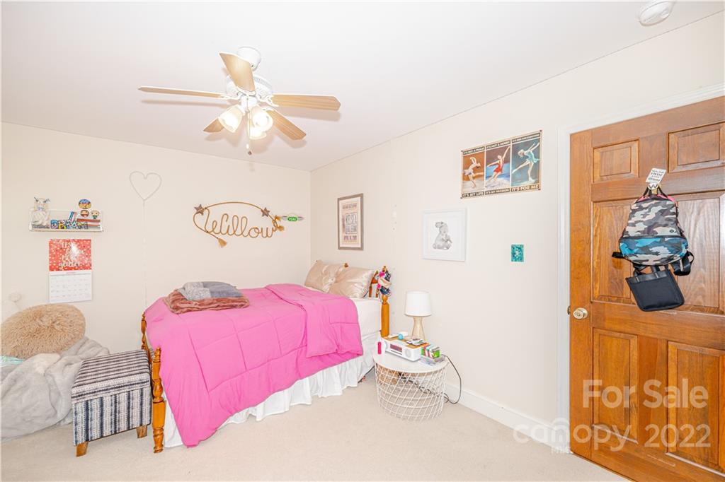 5100 Rounding Run Road Charlotte, NC 28277 - Photo 31 of 46 a bedroom with a bed and a window