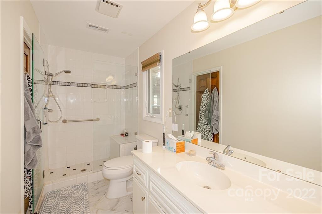 5100 Rounding Run Road Charlotte, NC 28277 - Photo 32 of 46 a bathroom with a sink toilet tub and shower