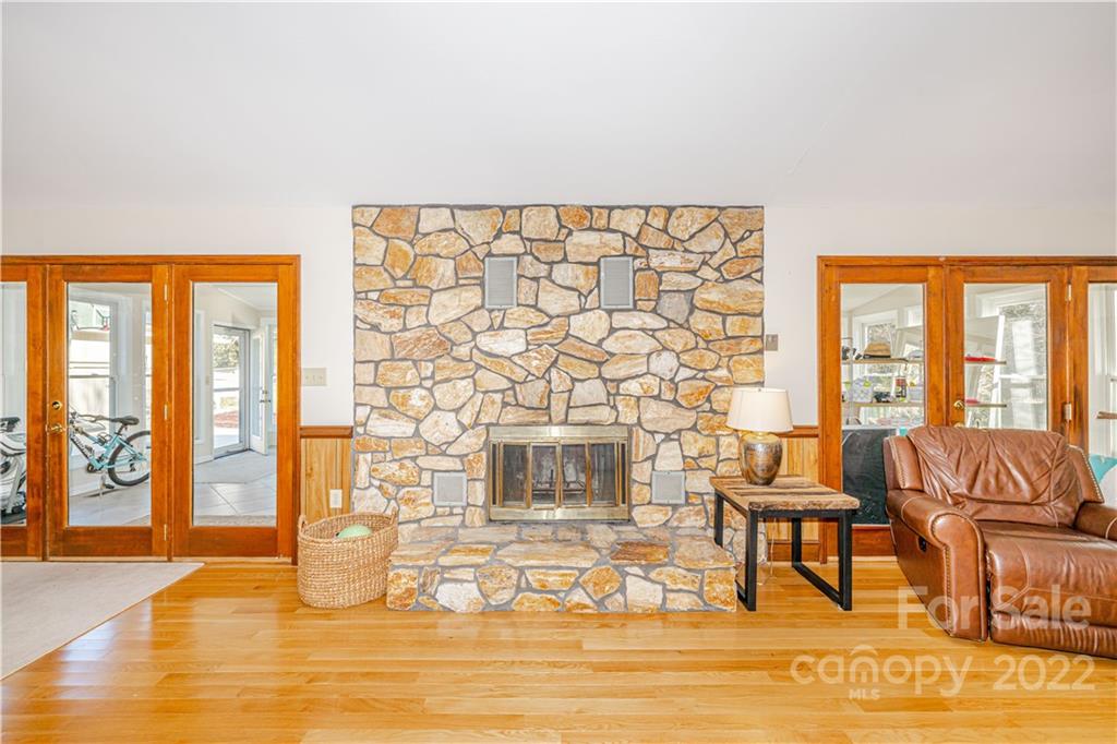 5100 Rounding Run Road Charlotte, NC 28277 - Photo 35 of 46 a living room with furniture and a floor to ceiling window