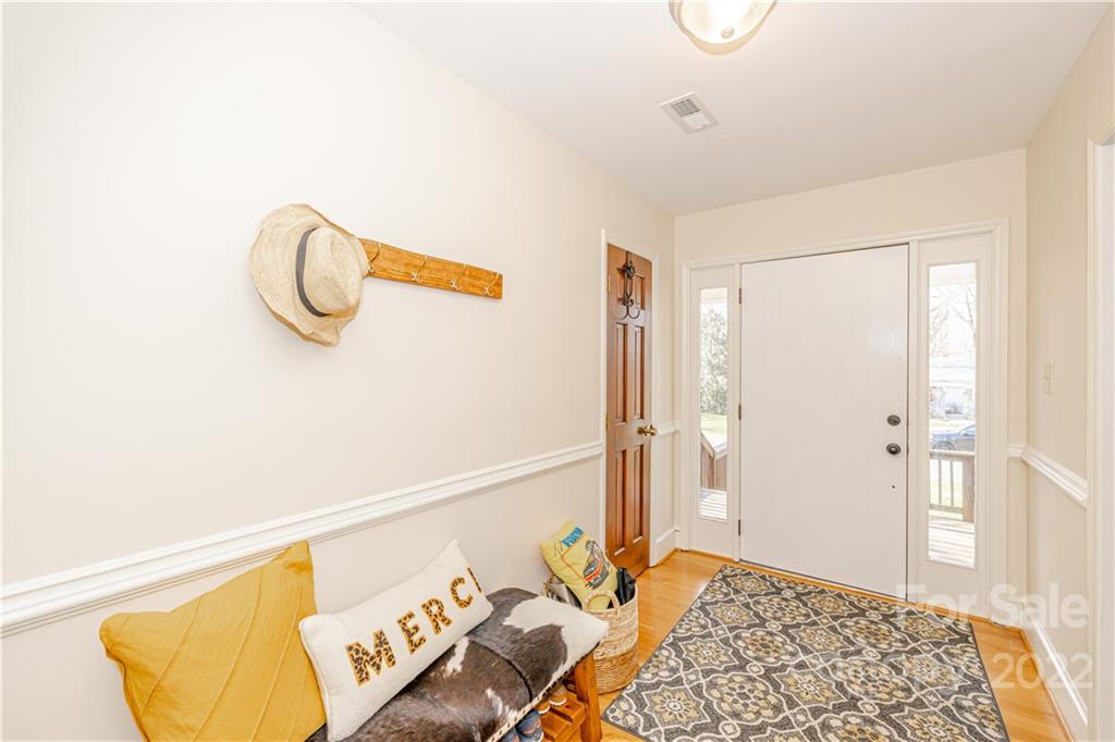 5100 Rounding Run Road Charlotte, NC 28277 - Photo 6 of 46 a bedroom with a bed and a rug