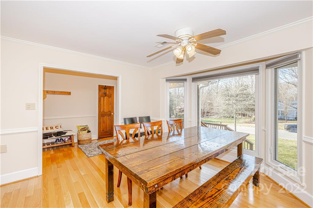 5100 Rounding Run Road Charlotte, NC 28277 - Photo 9 of 46 a dining room with large window a table and chairs