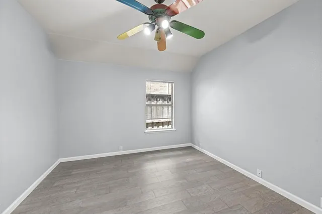 a bedroom with furniture and a chandelier