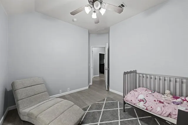 a bathroom with a sink a large mirror and shower